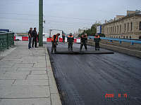 Ремонт дорожного покрытия на Арсенальной набережной 